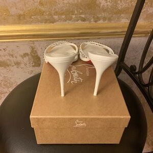 Christian Louboutin white mules